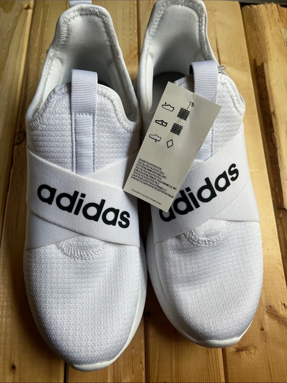adidas White Slip-On Sneakers with Black Logo